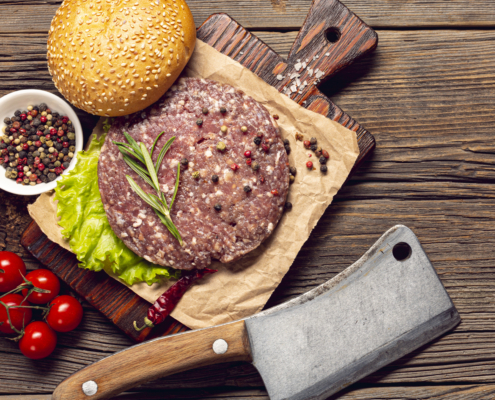 top-view-burger-ingredients-wooden-table copia